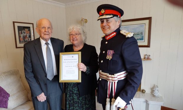 Sandy Ritchie has been given a BEM and a Pride of Buchan award for his community work. Pic: New Deer Community Association.