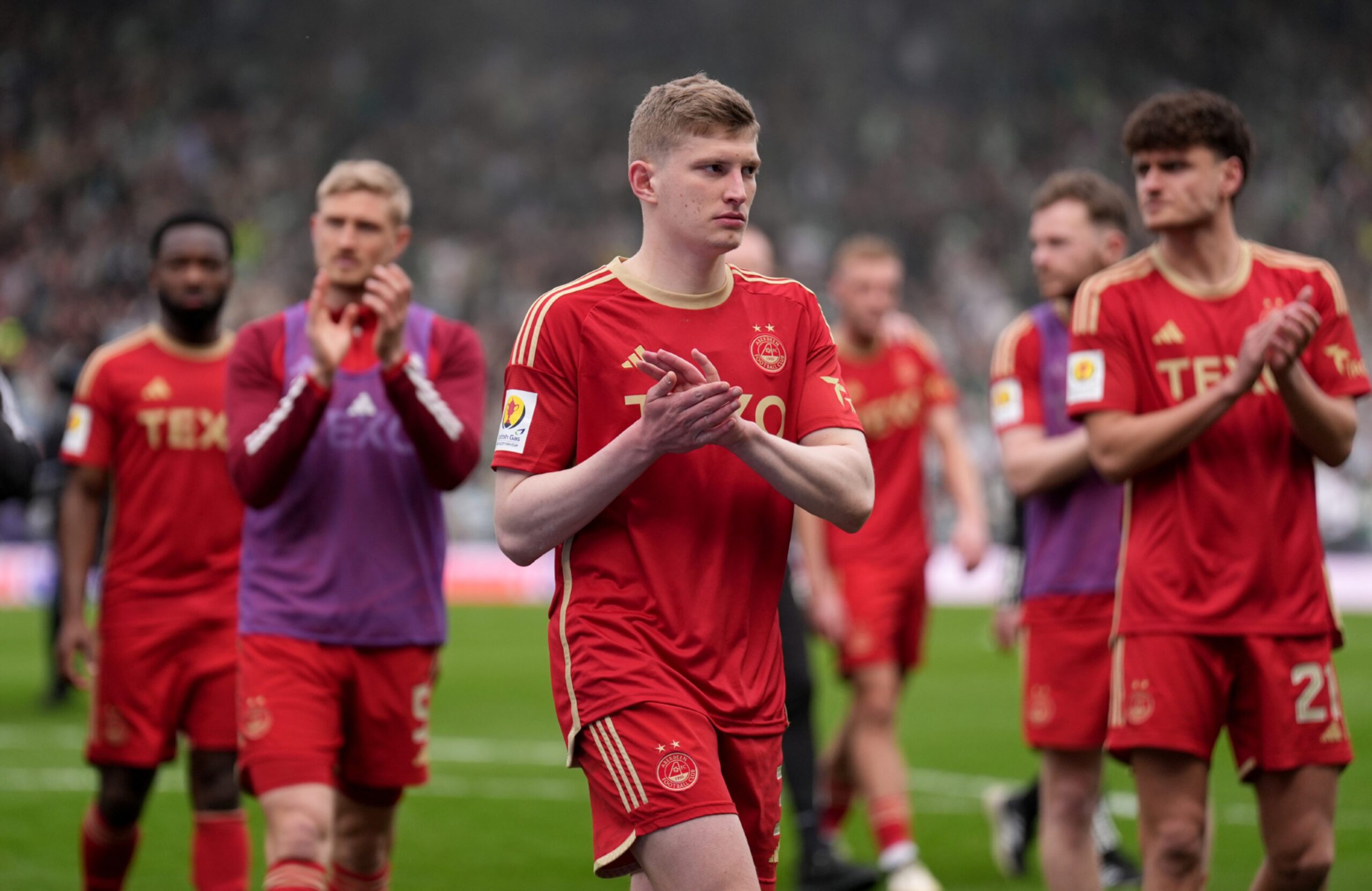 Aberdeen's Jack MacKenzie applauds the fans after losing the penalty shoot-out after the Scottish Gas Scottish Cup semi-final match at Hampden. Image: PA 
