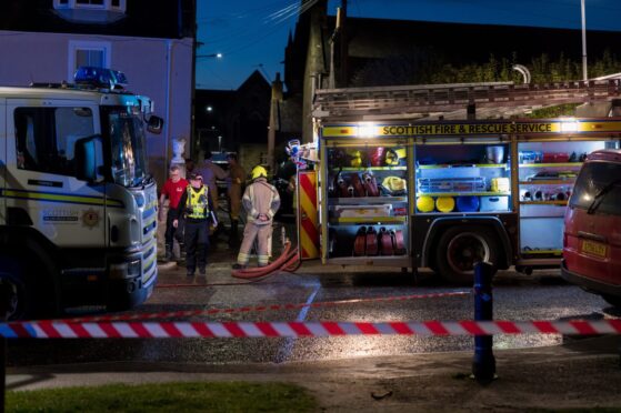 Fire crews outside a property in Forres. Image: Jasperimage.