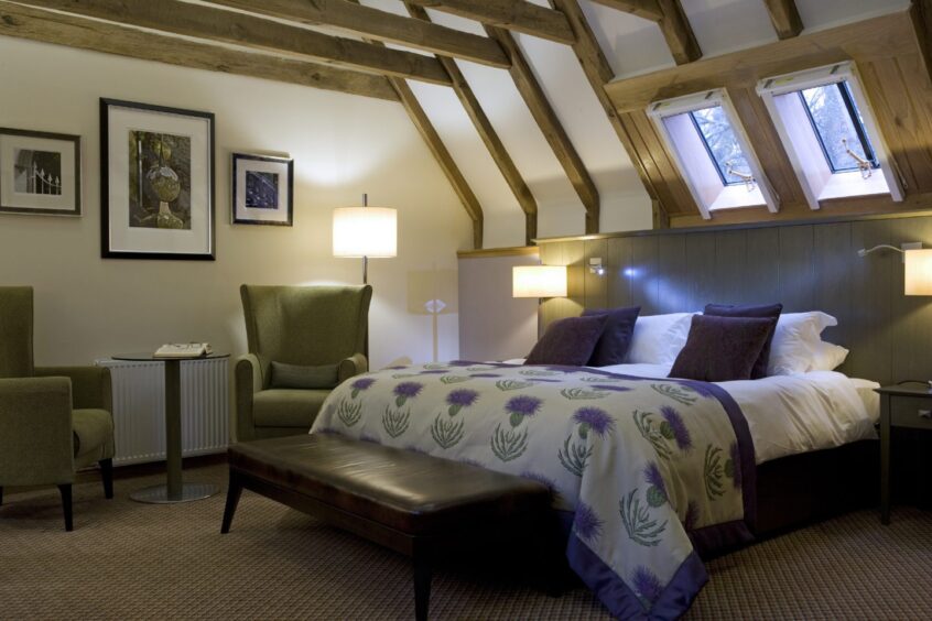 One of the guest bedrooms at Meldrum Country House Hotel. 