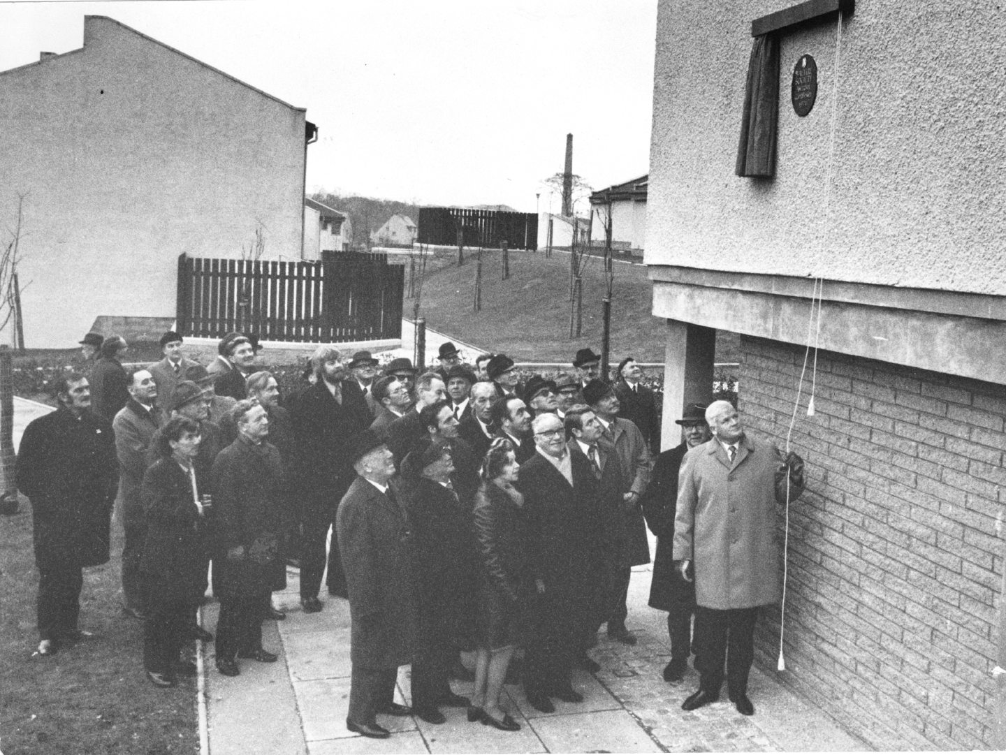 Aberdeen's housing convener, Councillor Robert Robertson, unveiling a Saltire Society award for design on Meadow Court, Tillydrone in 1972