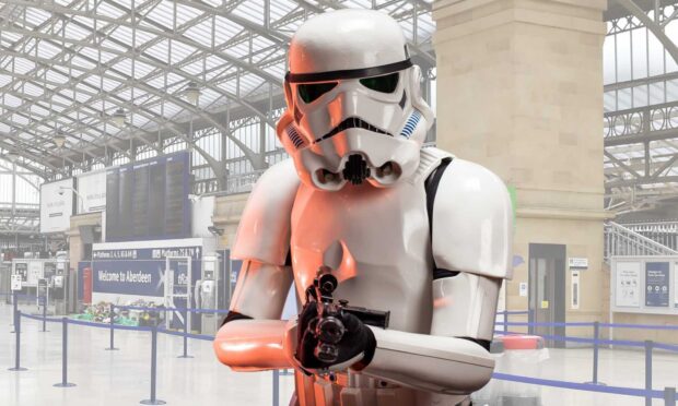 A Stormtrooper was reported for carrying a weapon in Aberdeen rail station.