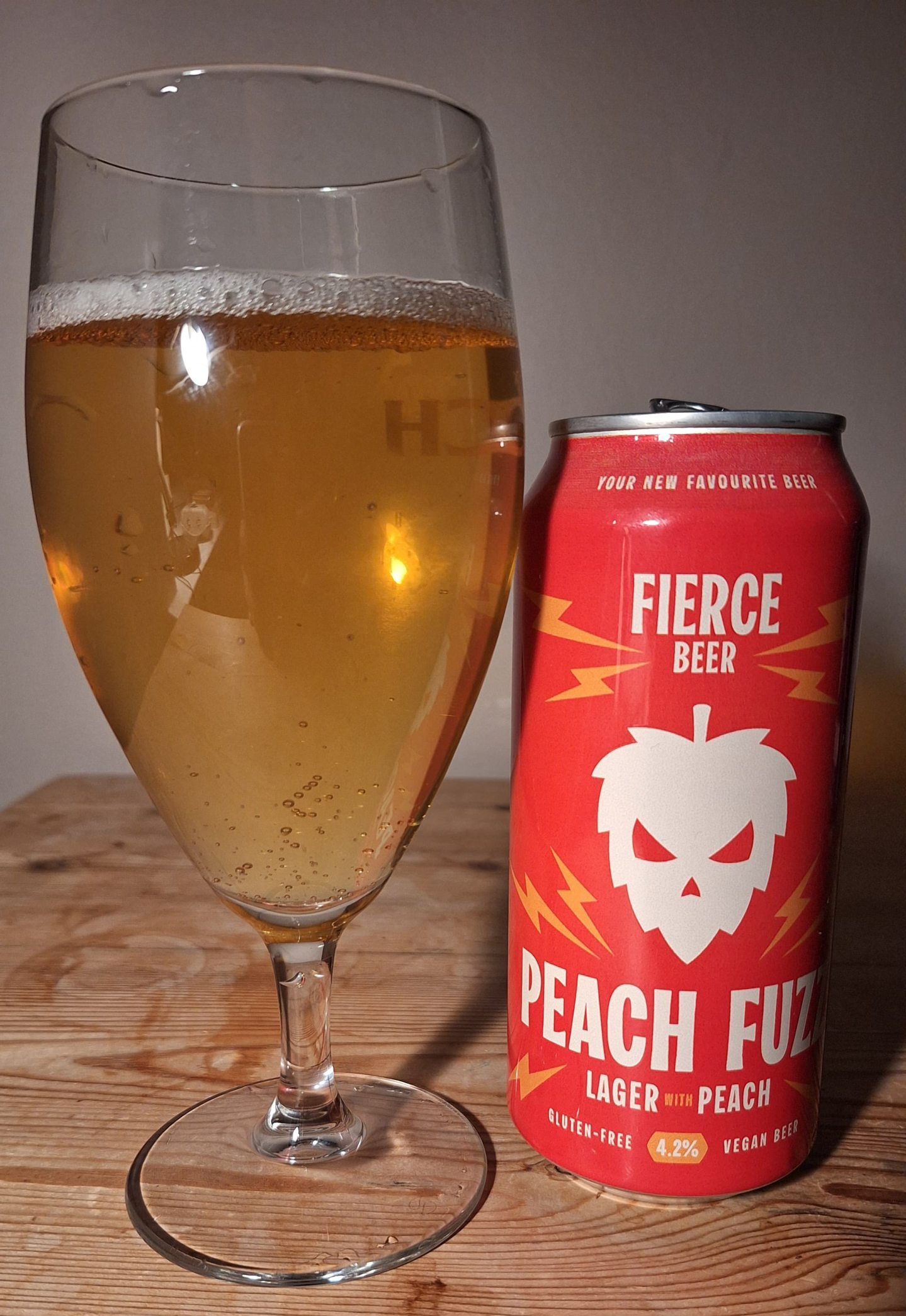 The Peach Fuzz lager from Fierce Beer poured into a glass. 