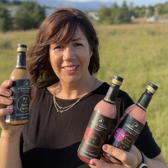 Mairi Hawkes with some of the boozy sauces from her brand Slainte Sauces.