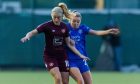 Hearts forward Katie Lockwood, left, battles with Olivia McLoughlin of Rangers in a SWPL fixture at the Oriam.