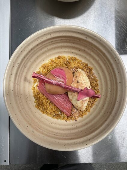 Ross's rhubarb crumble with rhubarb decorations and a white chocolate mousse.