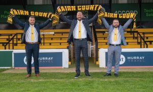 Ross Tokely (centre), Wayne Mackintosh (left) and Alan Geegan (right) being unveiled as the new management team at Nairn County. Image supplied by Nairn County.