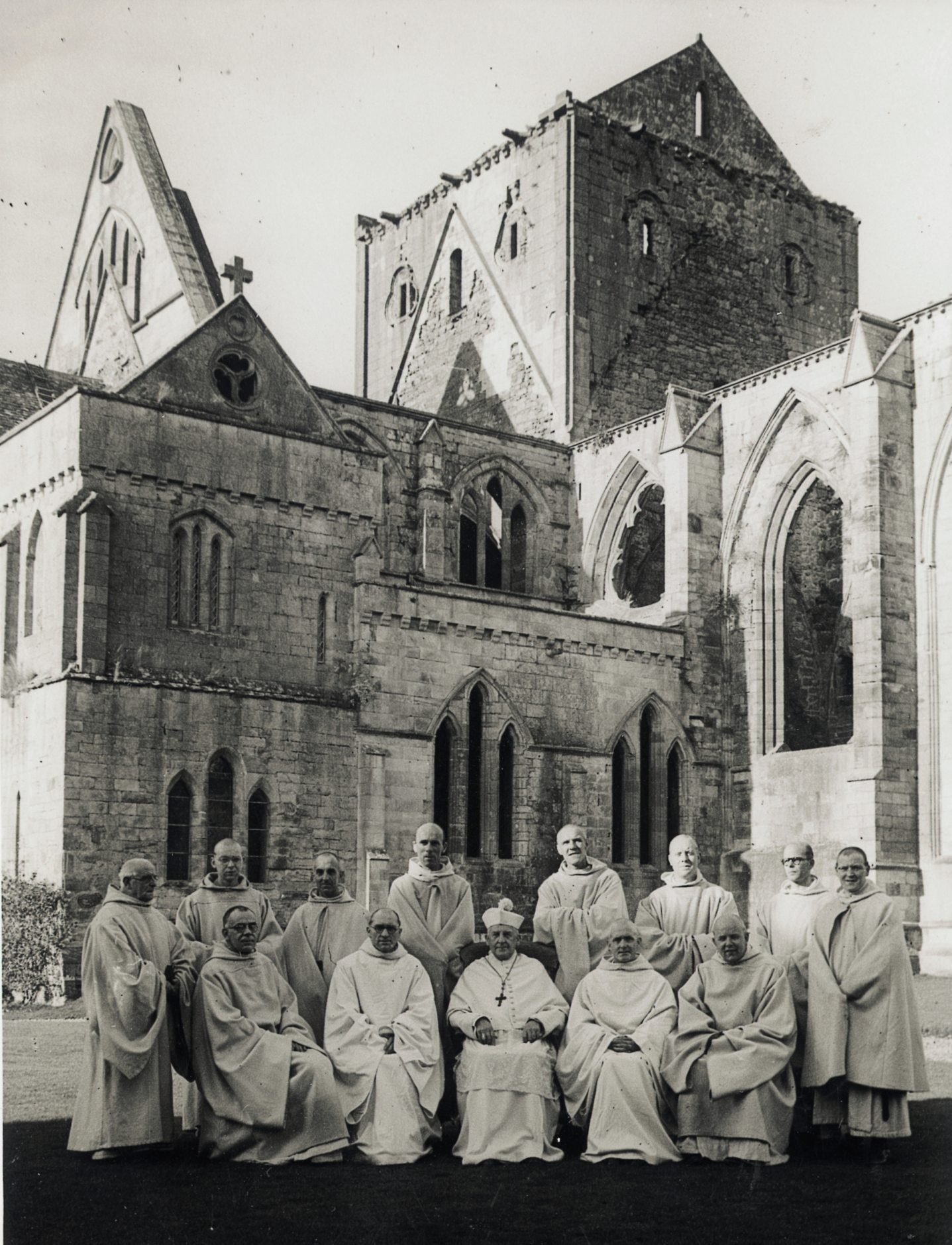 Black and white photo of Pluscarden Abbey monks. 