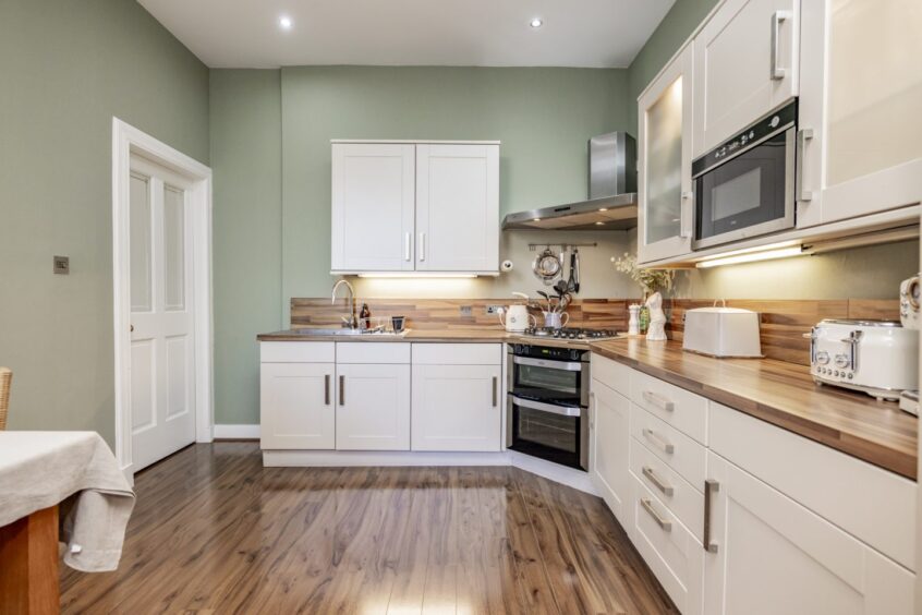 Modern kitchen inside the renovated apartment in Aberdeen's west end.