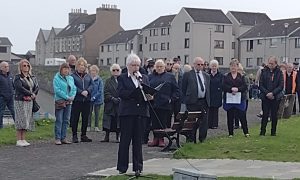 Jackie Dodds, of the Fishermen's Mission, highlights the tragic loss of fishers at sea during a memorial service in Wick.