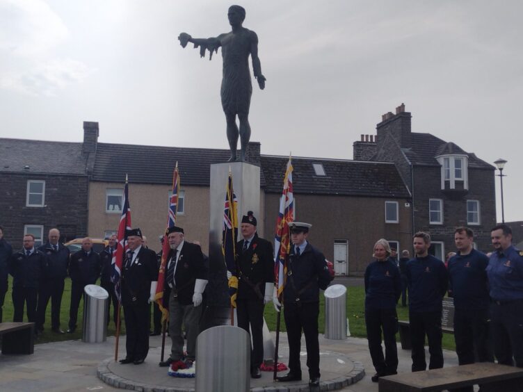 The Wick service took place next to the towns fishing industry memorial statue, erected last year.