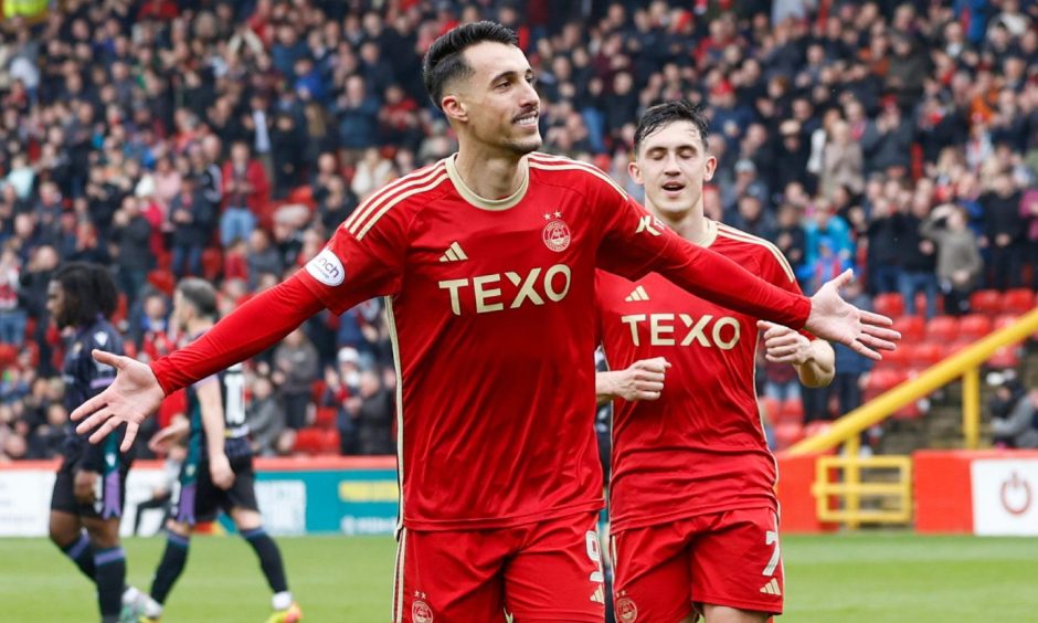 Striker Bojan Miovski celebrates after scoring a penalty to put Aberdeen 1-0 up against St Johnstone at Pittodrie. Image; Shutterstock