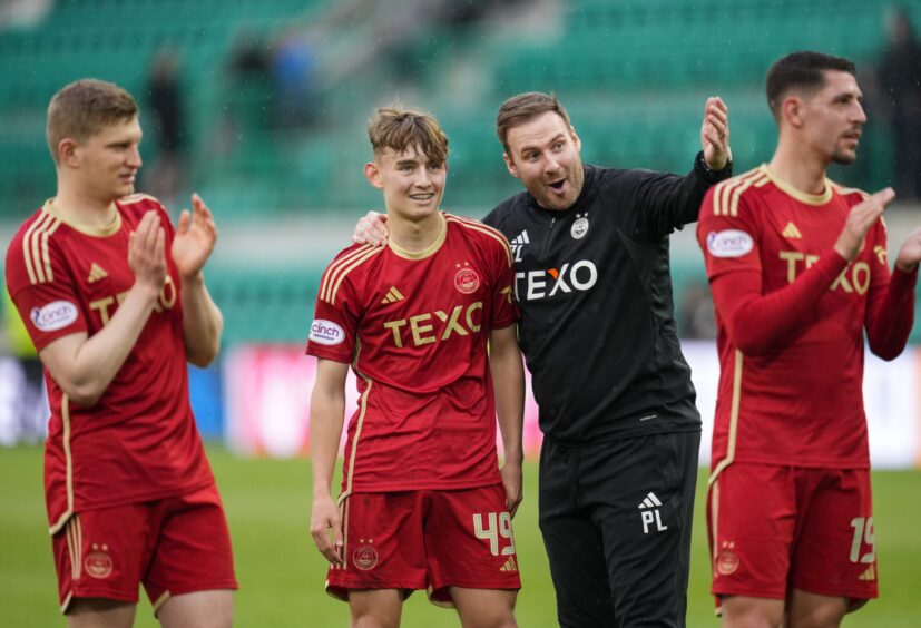 Aberdeen interim manager Peter Leven on the pitch with Fletcher Boyd of Aberdeen after the final whistle. Image: Shutterstock