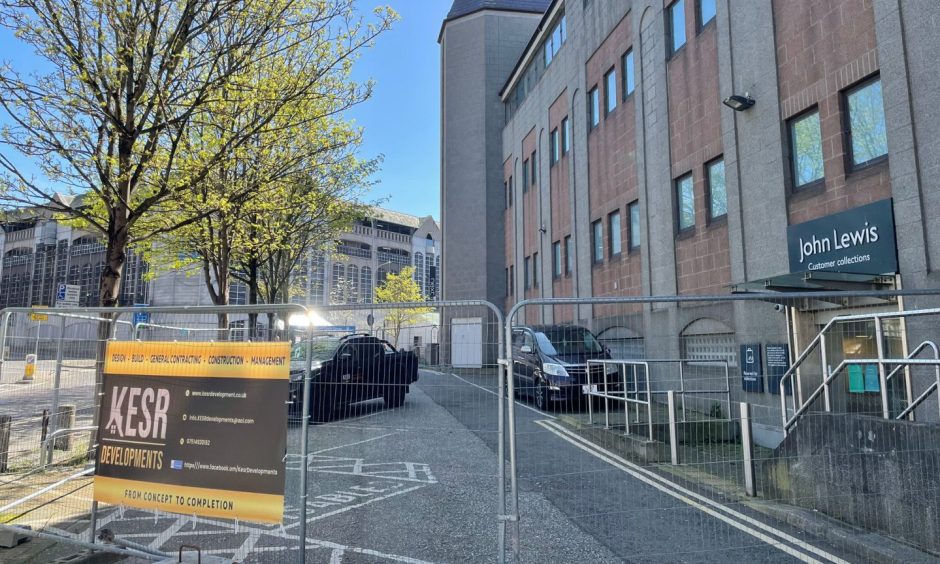 The sign of work beginning on Aberdeen's former John Lewis building. But what's going on?