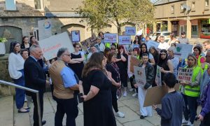 Councillors speak to protestors outside Moray Council HQ.