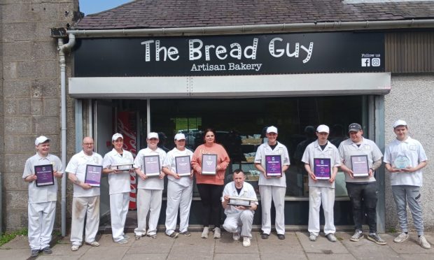 The Bread Guy team celebrating their win.