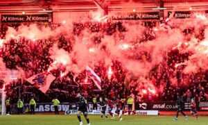 The teenager had been travelling to Dens Park with pyrotechnics. Image: Rob Casey/SNS