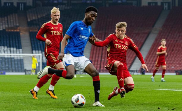 Rangers' Paul Nsio and Aberdeen's Cameron Wilson in action during the Scottish Youth Cup final at Hampden. Image: SNS