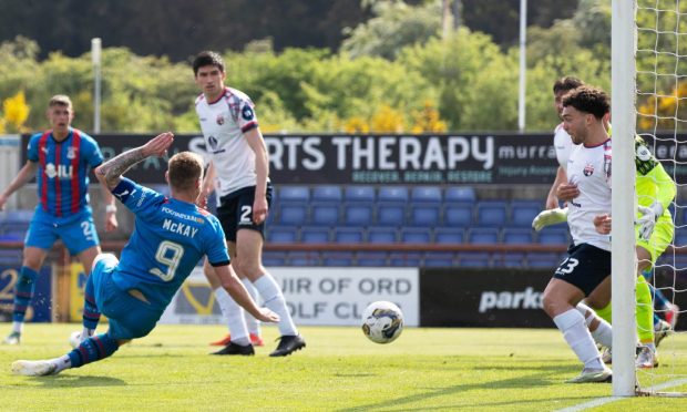 Billy Mckay slots away Caley Thistle's winner against Montrose in the Championship play-off semi-final.