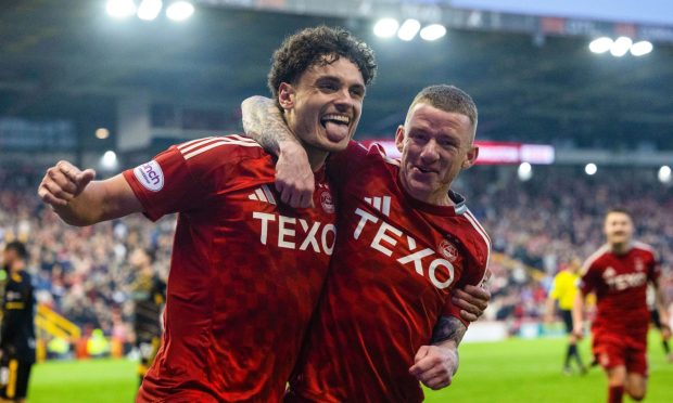 Aberdeen's Dante Polvara celebrates with Jonny Hayes after scoring to make it 3-1 against Livingston on May 15. Image: SNS.