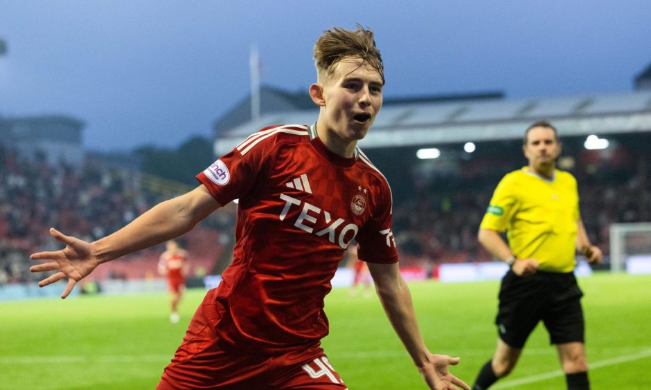 Aberdeen's Fletcher Boyd celebrates with Graeme Shinnie after scoring to make it 5-1 against Livingston. Image: SNS