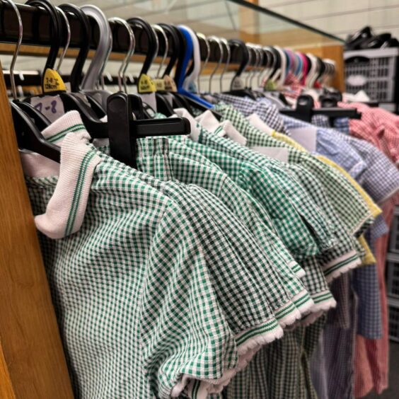 Rack of school uniforms inside the new Moray School Bank charity shop inside the former Mountain Warehouse unit at Elgin's St Giles Centre.