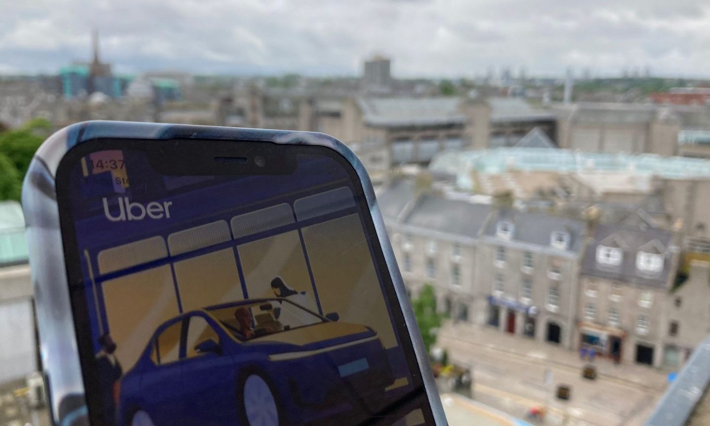 Uber app on phone in Aberdeen.