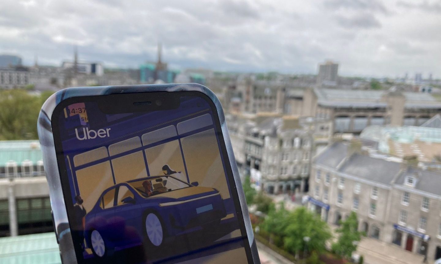 Uber app on phone in Aberdeen.