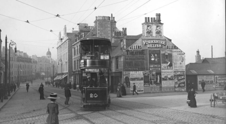 Adverts all over the wall in the late 1800s. 