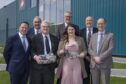 Front row, from left, Colin Duffy, ABP operations director, George Burgess, director of agriculture and rural economy, Sarah Millar, chief executive of QMS, Jim Fairlie, agriculture minister. Top row, from left, John Burton, ABP finance director, Bob
Carnell, managing director of ABP’s UK d, and Frank Ross, general manager at ABP Perth.