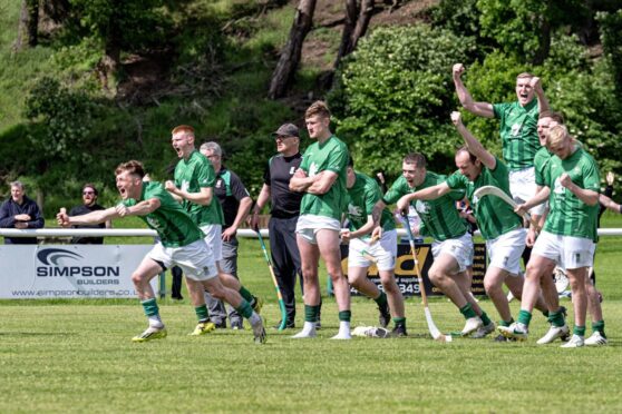The moment the Beauly team realise they have won the penalty shoot-out against Kinlochshiel in the Camanachd Cup. Image: Neil Paterson.