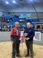 The overall honours in the pre-sale show went to George Howie, left, pictured with Steven Eddie of sponsors East Coast Viners.