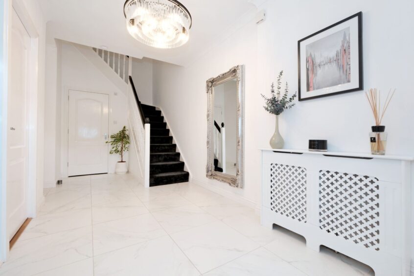 The hallway and stairs in the renovated townhouse Aberdeen