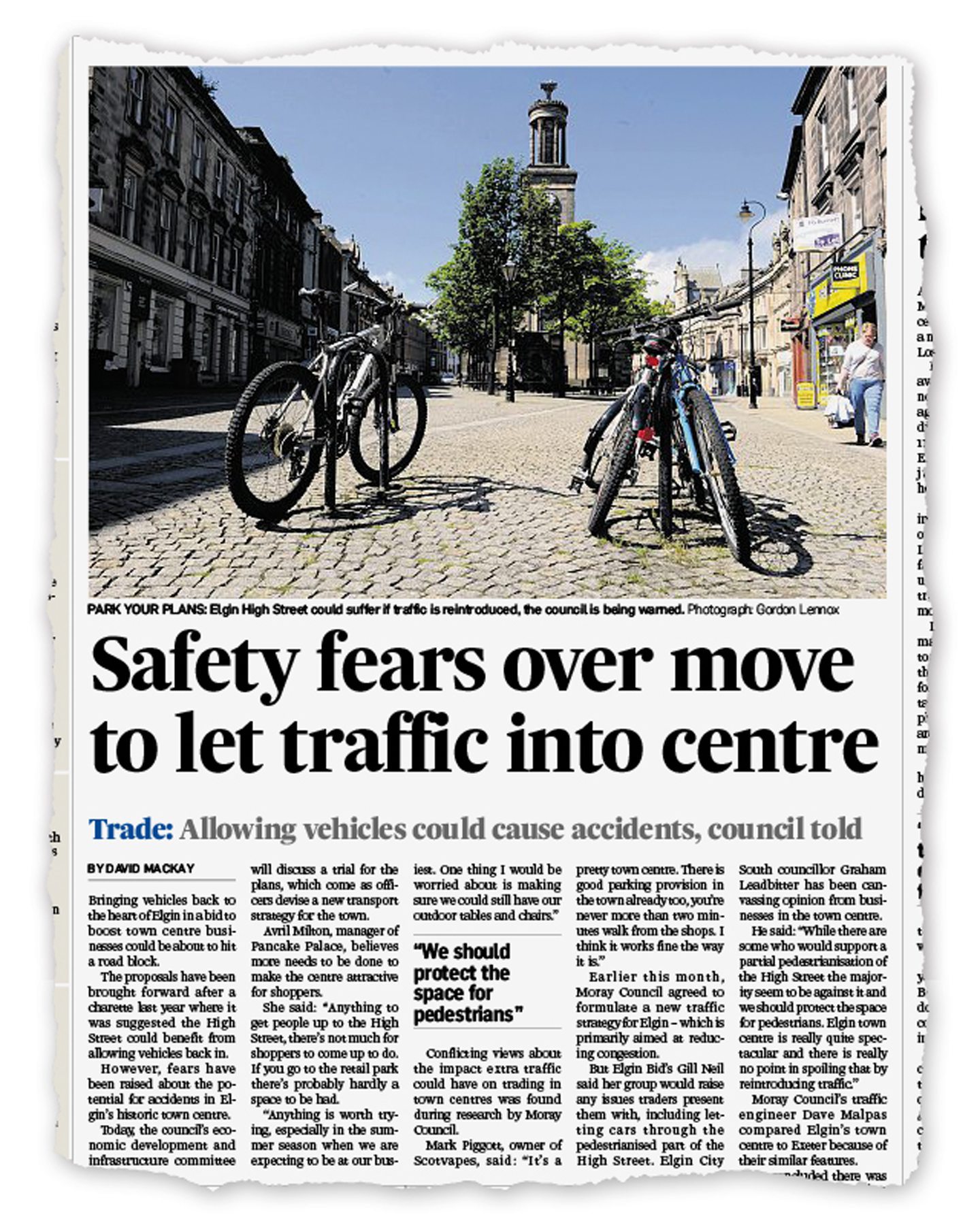 Newspaper cutting from Press and Journal reading "safety fears over move to let traffic into centre". 