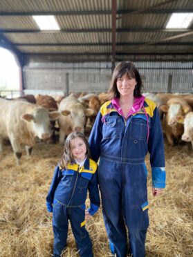 Elaine Duguid pictured on the farm with daughter Addison.