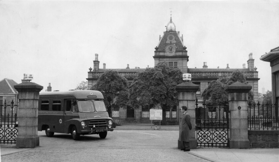 An ambulance races out of the City Hospital on the way to another typhoid victim in June 1964.