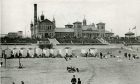 The Beach Baths at Aberdeen seafront in the early 20th Century, the Victorian bathing huts can be seen on the beach. Image: DC Thomson