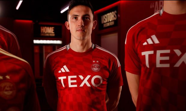 Jamie McGrath models the new Aberdeen kit for the 2024-25 season. Image: Aberdeen FC.