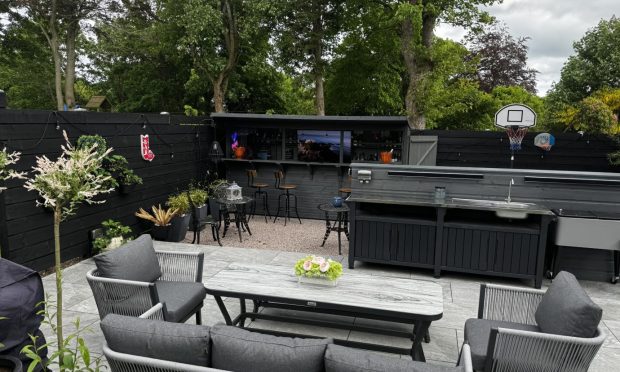 The Spearitts have been allowed to keep their garden shed bar after the Cults family won a fight for planning permission. Image: Stuart Spearritt