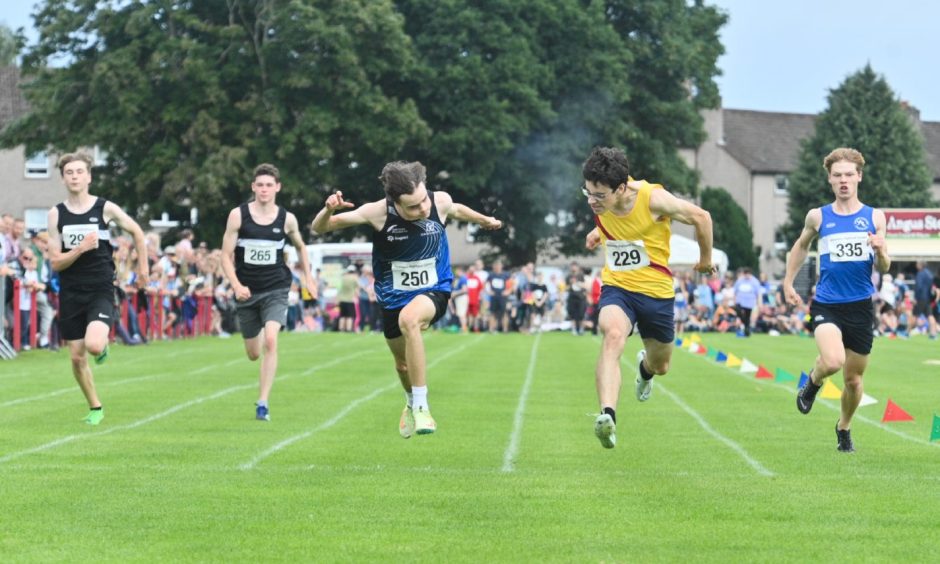 Runners competing at the Highland Games in Inverness