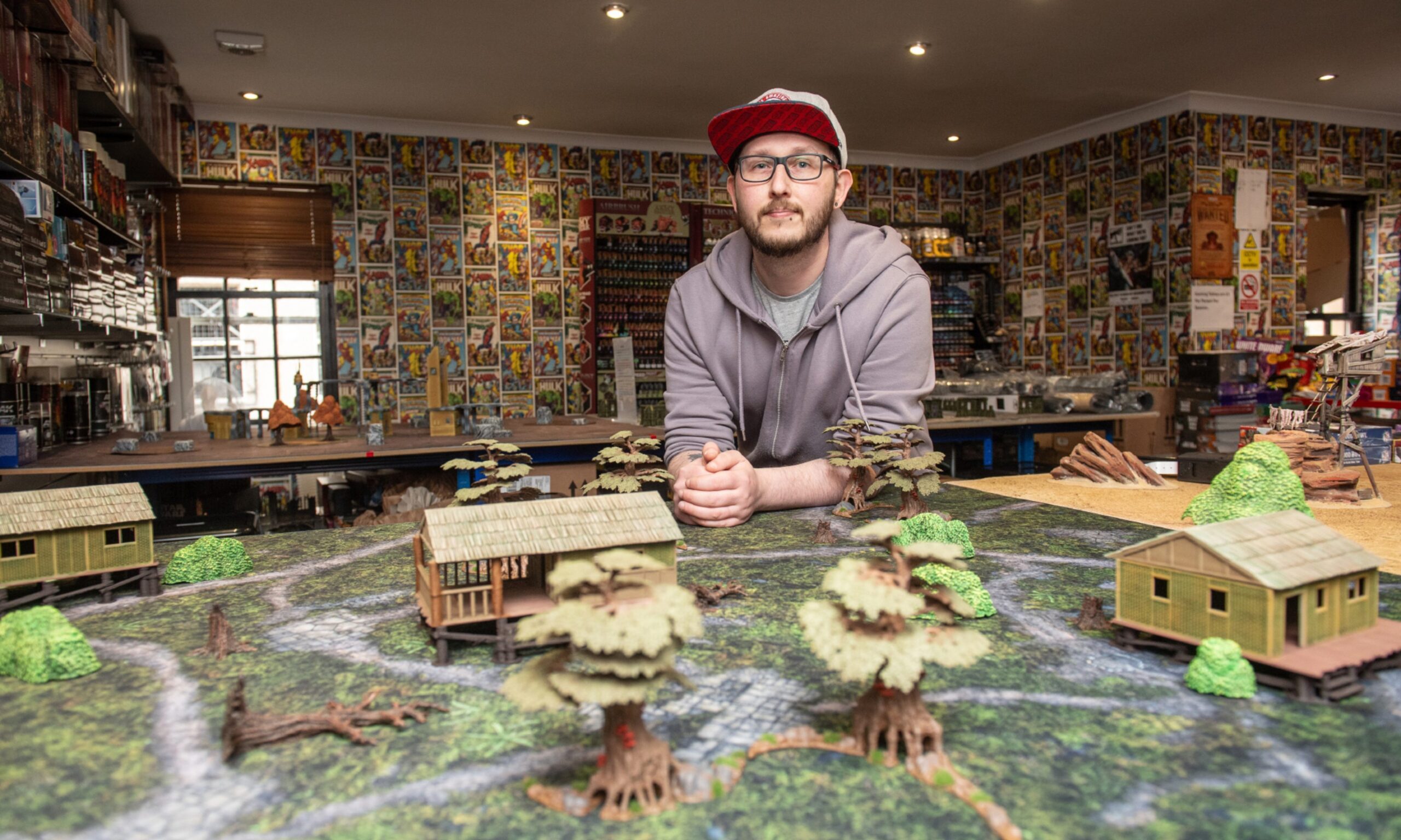 Peter Ralston leaning over gaming table. 