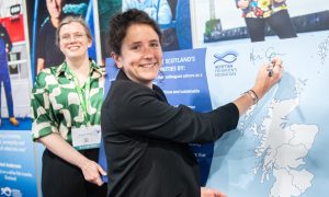 Rural Affairs Secretary Mairi Gourgeon becomes the latest politician to sign a pledge to support Scottish fishing and coastal communities.