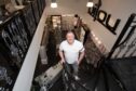 Bijou Elgin owner David Robertson is pictured inside the shop. Image: Jason Hedges/DC Thomson