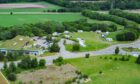 Several caravans have set up on HIE land. Image: DC Thomson.