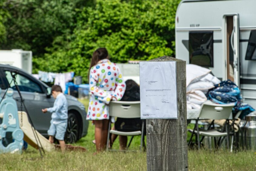 Notice at traveller camp site near Forres Enterprise Park.