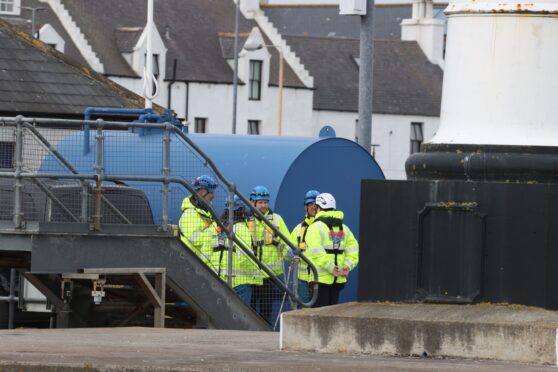 Police in Kirkwall Harbour after a body was found.