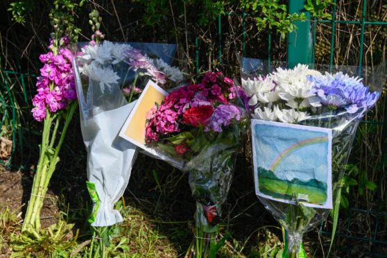 Tributes have been left outside the Plymouth Brethren meeting hall.
Image: Kenny Elrick/DC Thomson  16/05/24