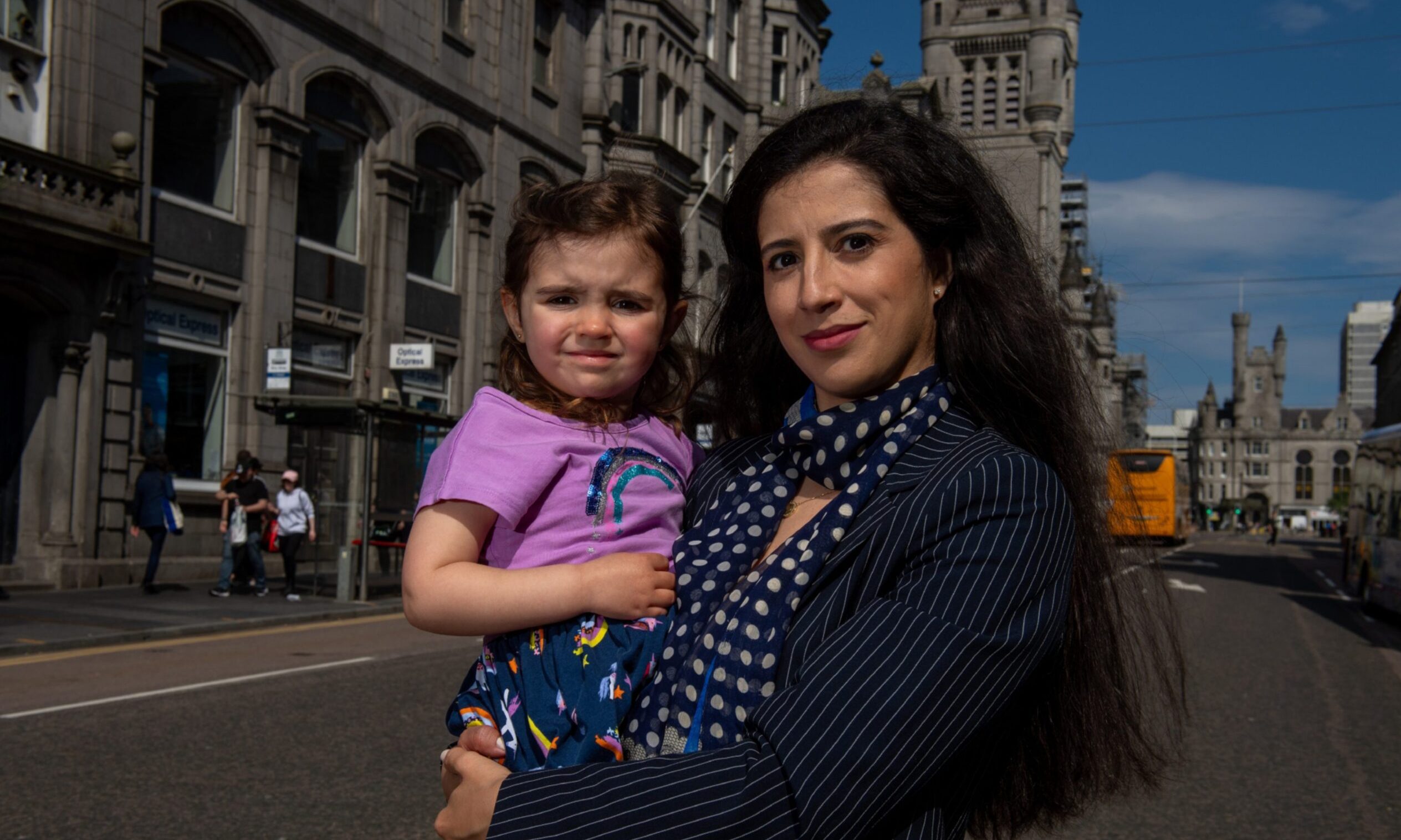 Soumaya El Kadiri pictured with their daughter Alice, 4, in the middle of Union Street.