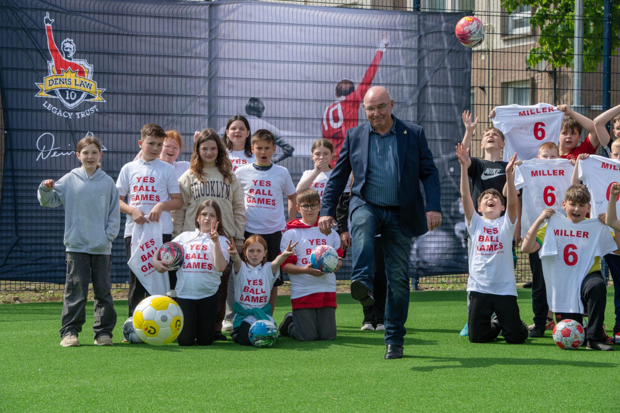 Willie Miller opening the new Cruyff Court with local kids.