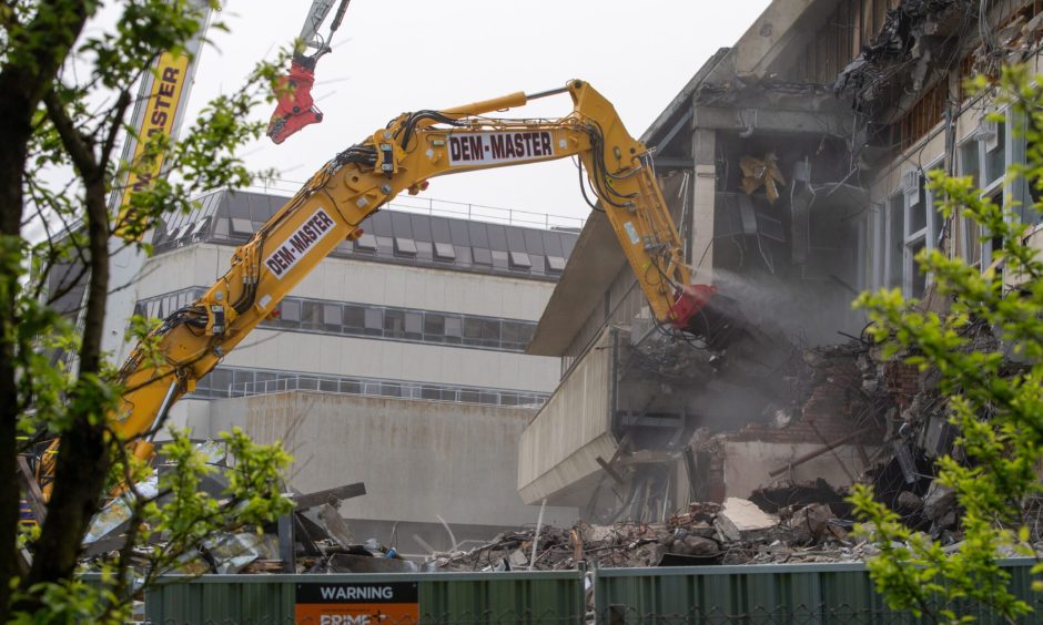 Digger tearing down the Altens building.